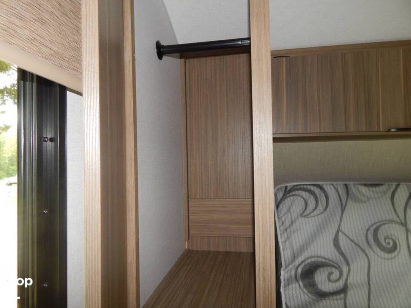 A photo of this 2025 Forest River Wildwood 32 Veranda