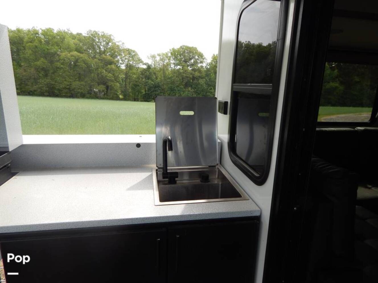 A photo of this 2025 Forest River Wildwood 32 Veranda