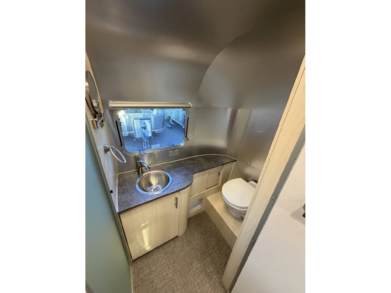 A photo of this 2022 Airstream FLYING CLOUD 23FB QUEEN
