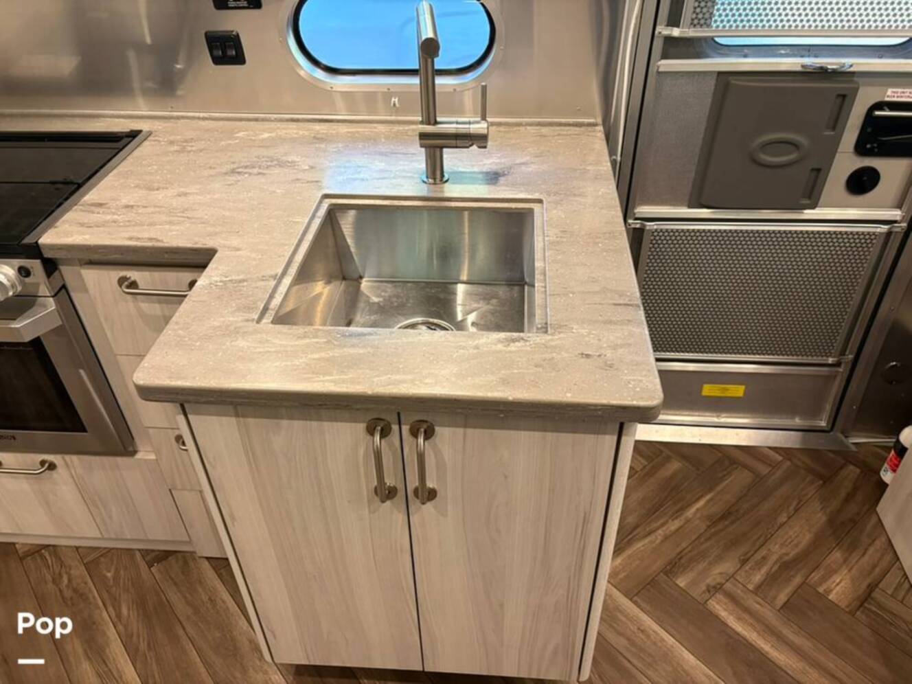 A photo of this 2021 Airstream International 25FB Twin Rear Hatch