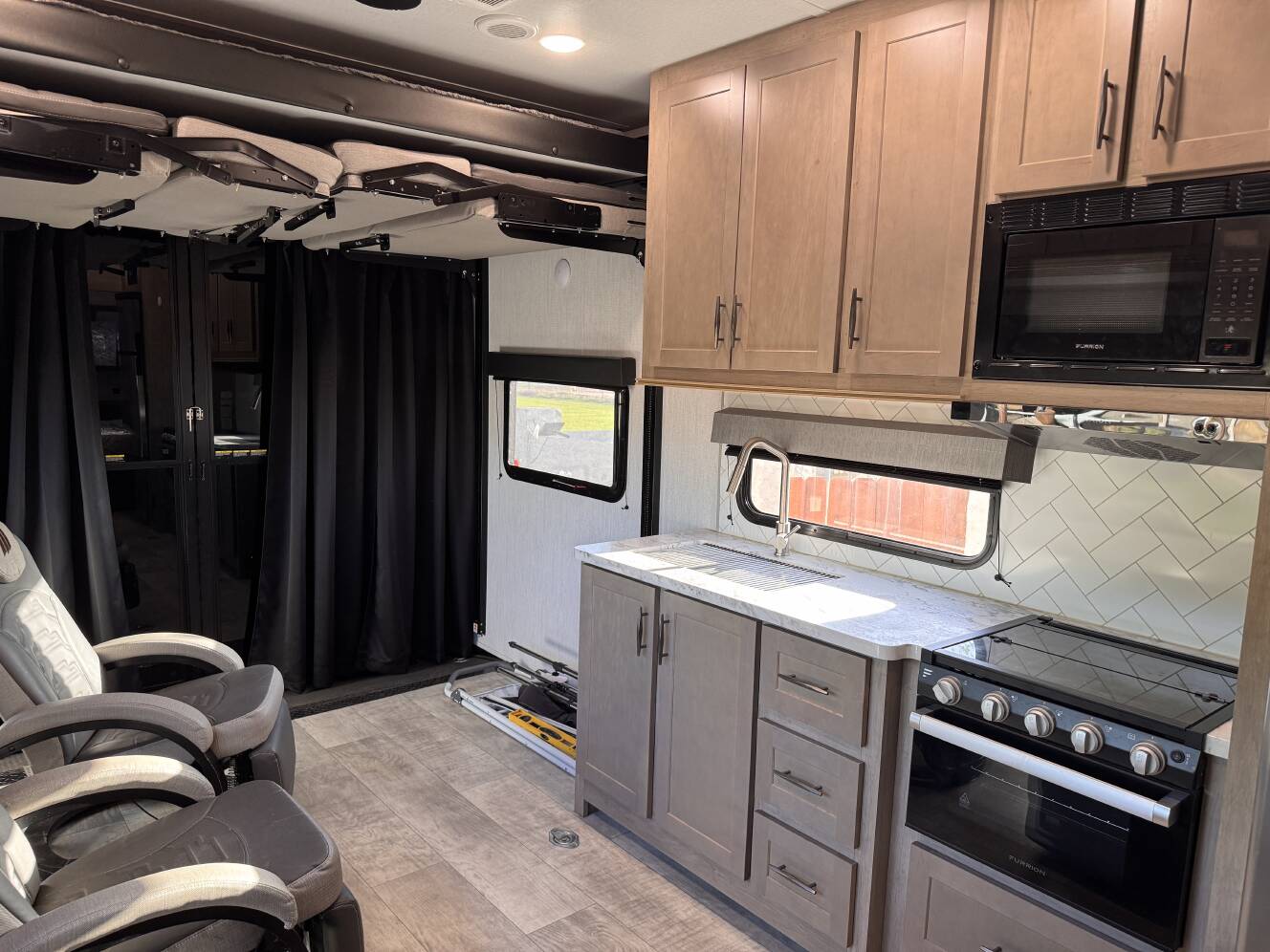 A photo of this 2023 Grand Design MOMENTUM G-CLASS 21G