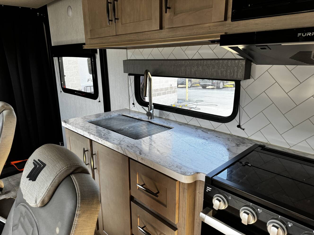 A photo of this 2023 Grand Design MOMENTUM G-CLASS 21G