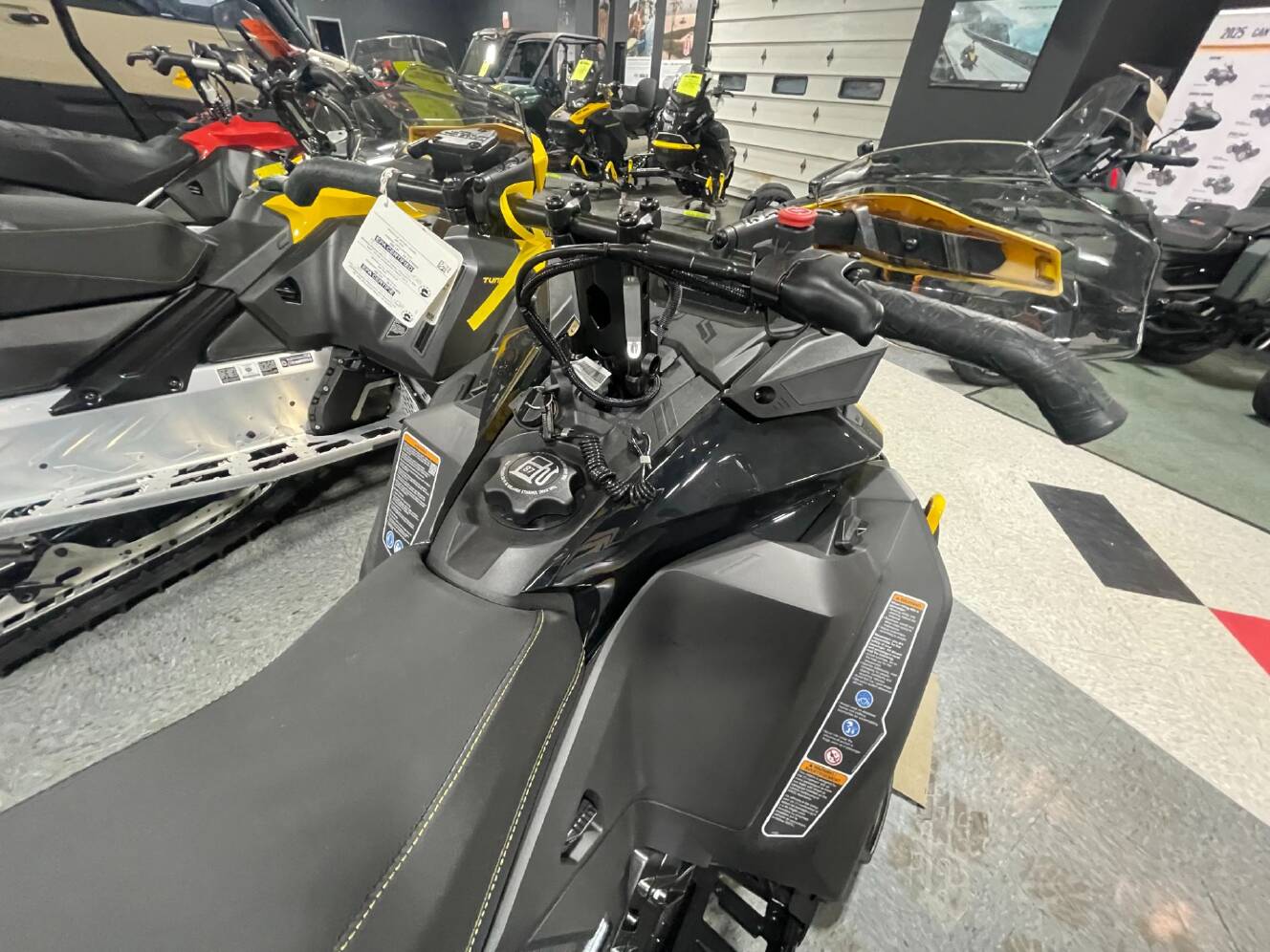 A photo of this 2025 Ski-Doo MXZ NEO 600 EFI ES RipSaw 1.25