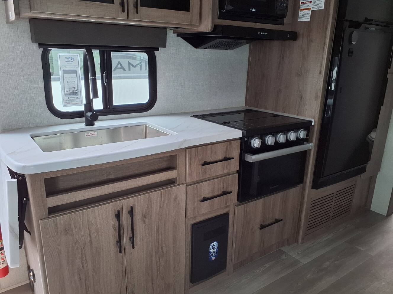A photo of this 2024 Grand Design Imagine XLS 22BHE