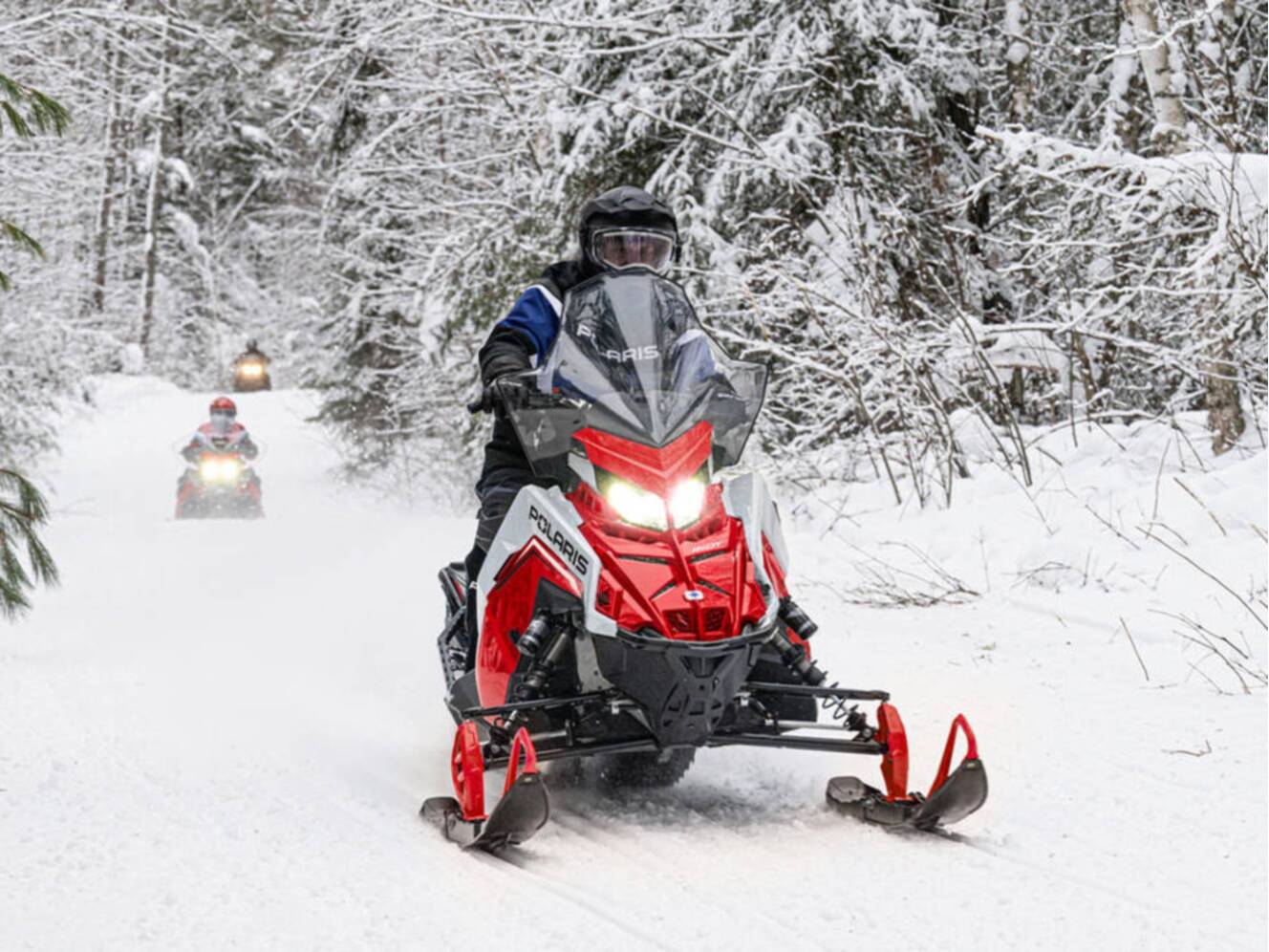 A photo of this 2027 Polaris 650 INDY Adventure 137 Indy Red 1.35 ES