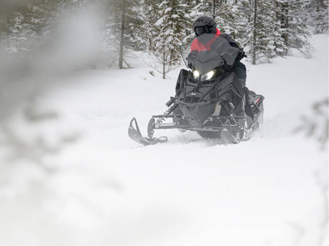 A photo of this 2027 Polaris 650 INDY Adventure 137 Indy Red 1.35 ES