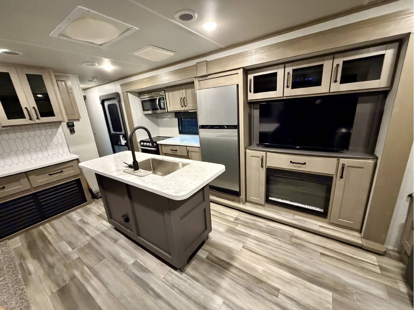 A photo of this 2023 Grand Design REFLECTION 297RSTS