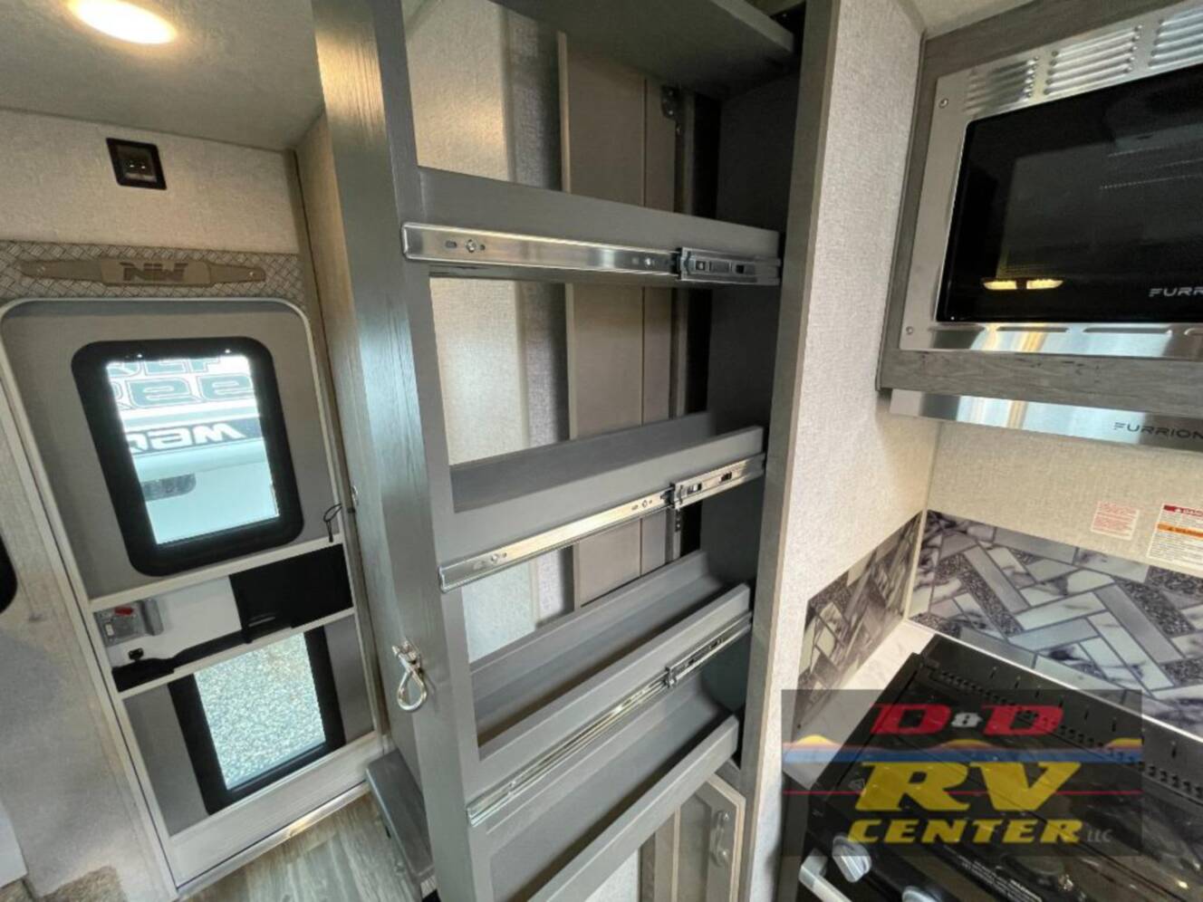 A photo of this 2027 Northwood Arctic Fox Camper 990