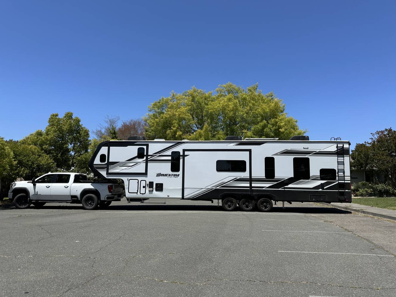 A photo of this 2025 Grand Design MOMENTUM M-CLASS 395MS