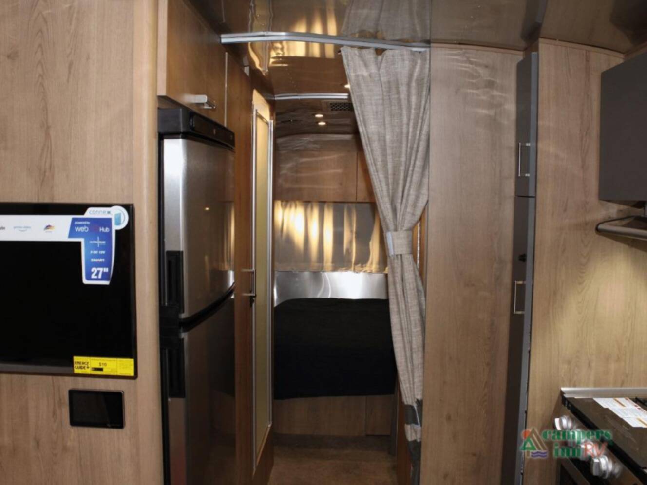 A photo of this 2026 Airstream Trade Wind 25FBQ