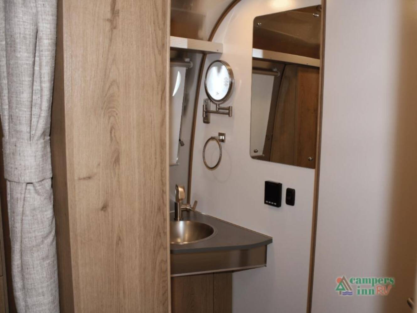 A photo of this 2026 Airstream Trade Wind 25FBQ