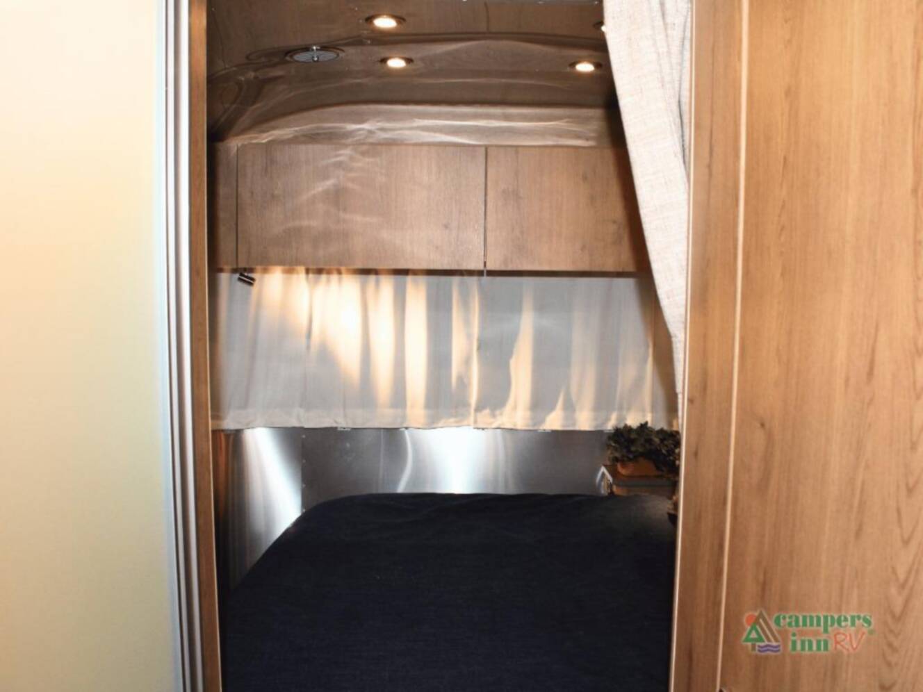 A photo of this 2026 Airstream Trade Wind 25FBQ