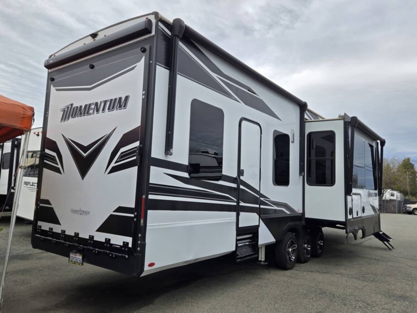 A photo of this 2023 Grand Design Momentum 395MS