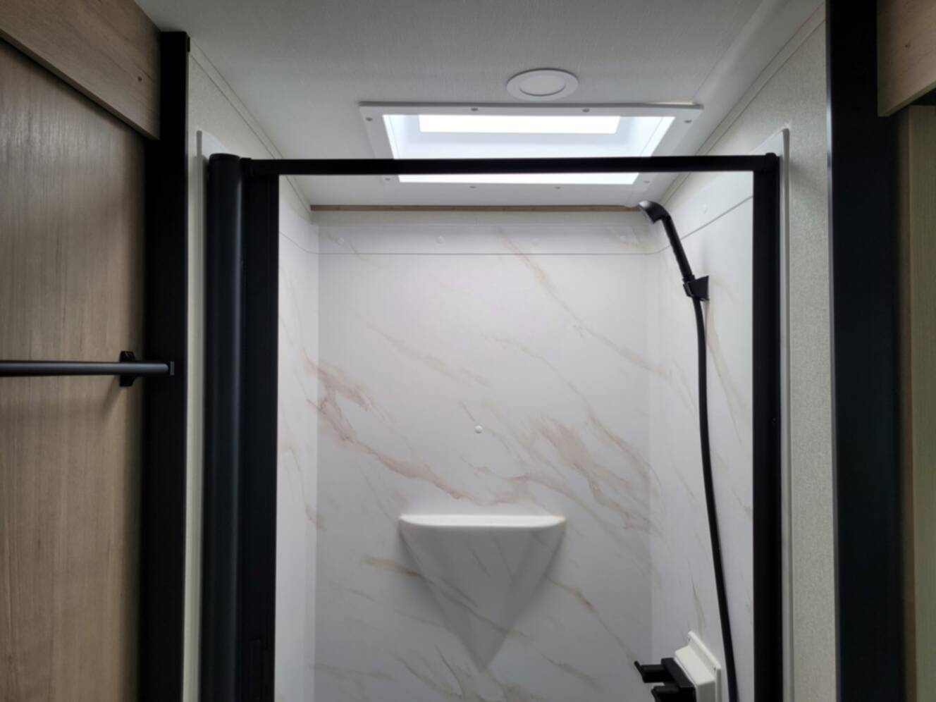 A photo of this 2026 Grand Design Imagine 3210BH