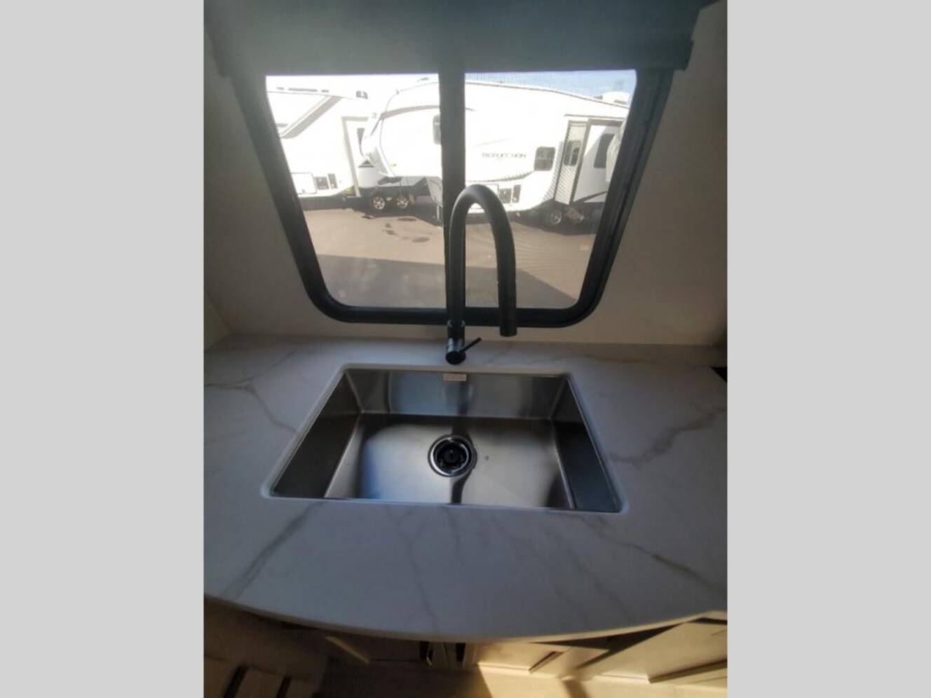 A photo of this 2026 Grand Design Reflection 100 Series 24RL