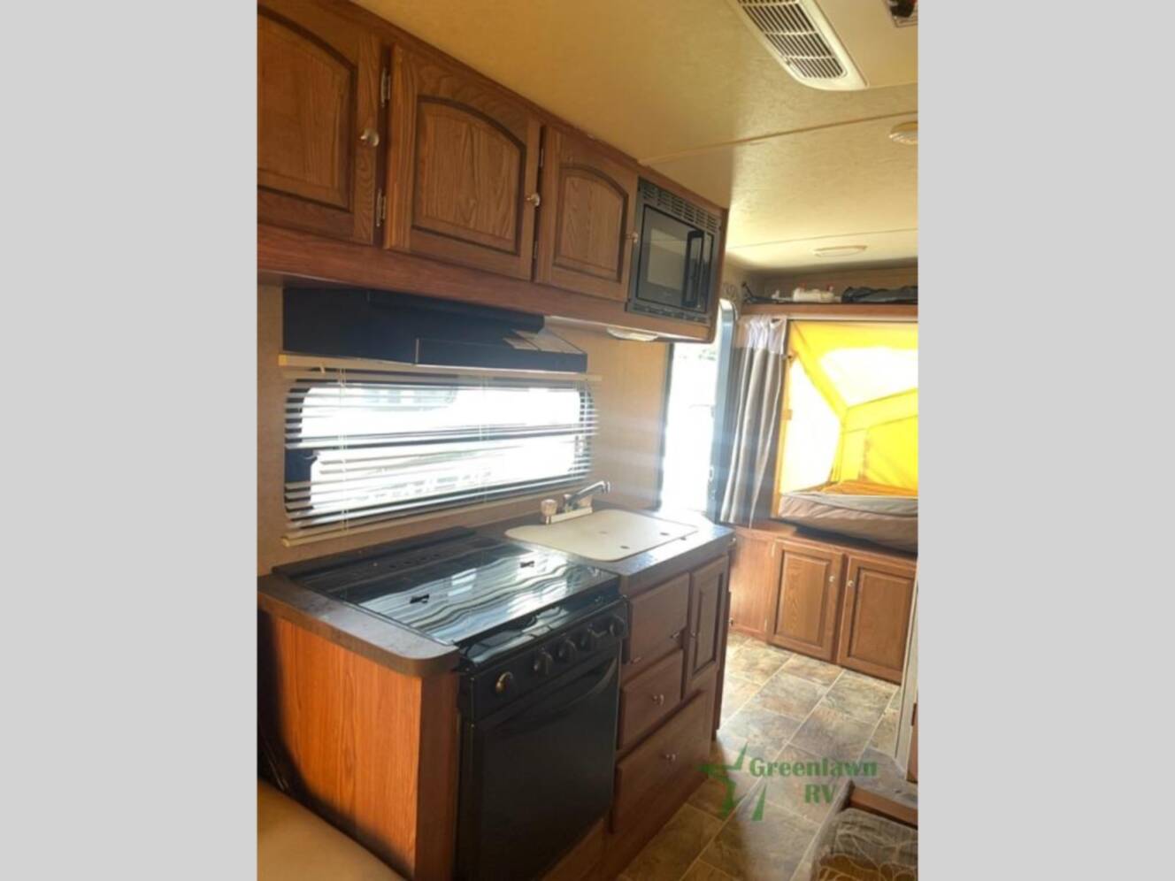 A photo of this 2015 Forest River Rv Rockwood Roo M-19