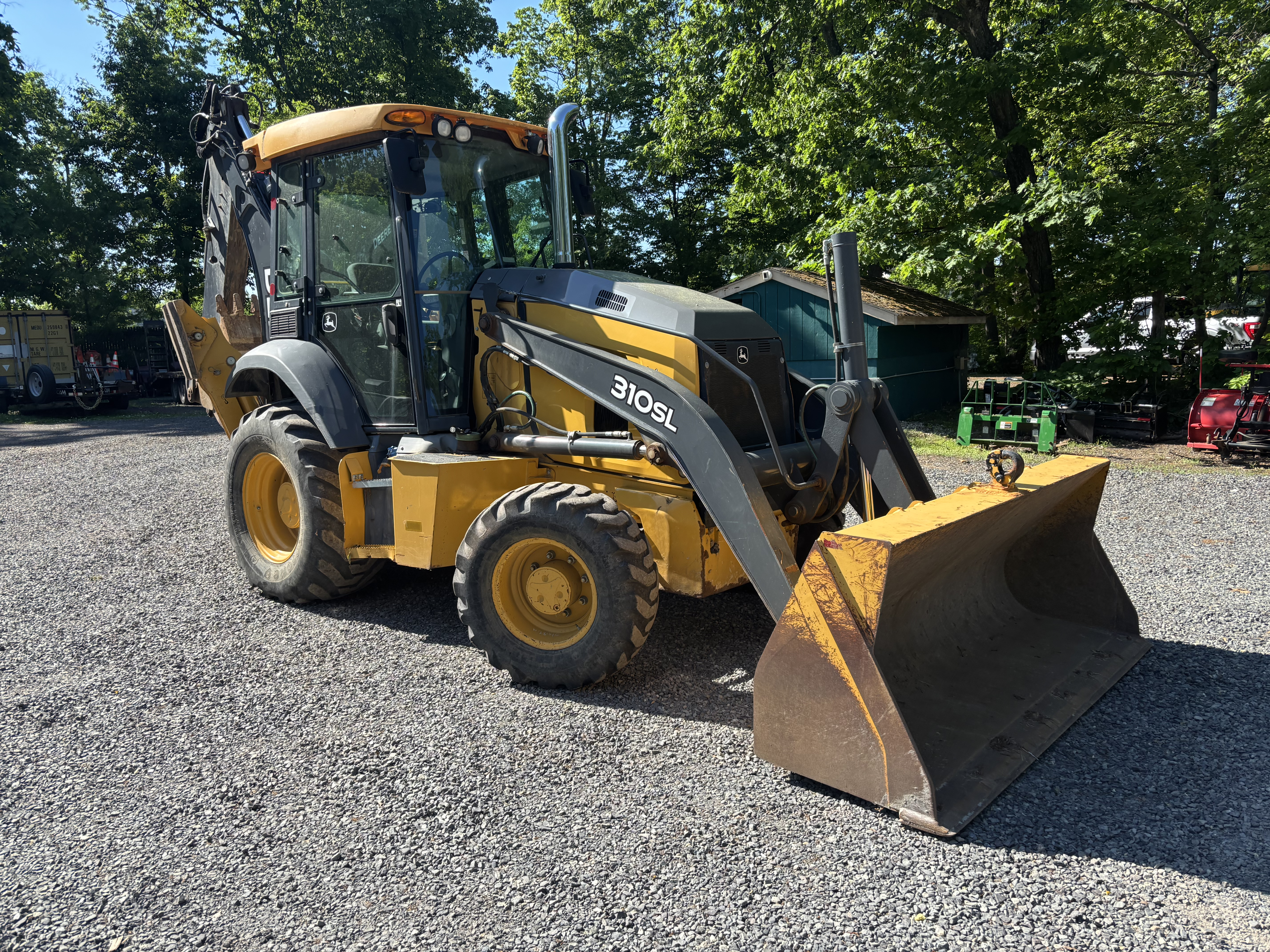2020 JOHN DEERE 310SL in Spring City, PA