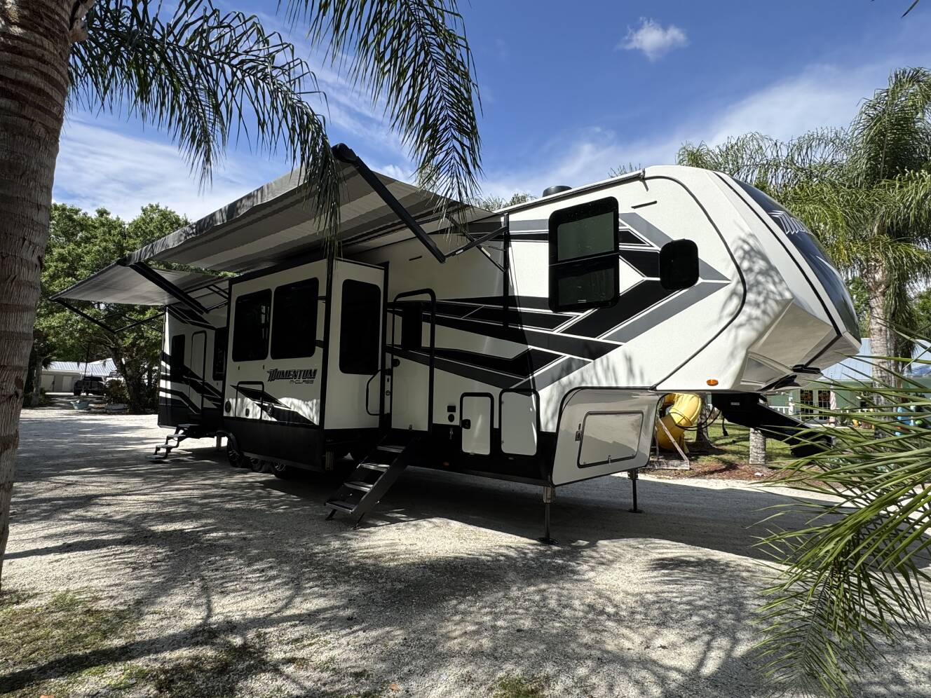 A photo of this 2021 Grand Design MOMENTUM M-CLASS 398MR