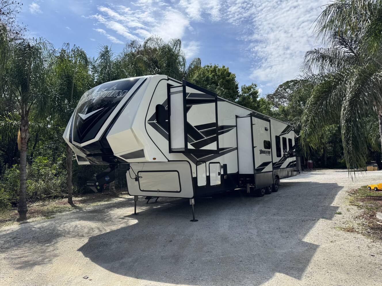 A photo of this 2021 Grand Design MOMENTUM M-CLASS 398MR