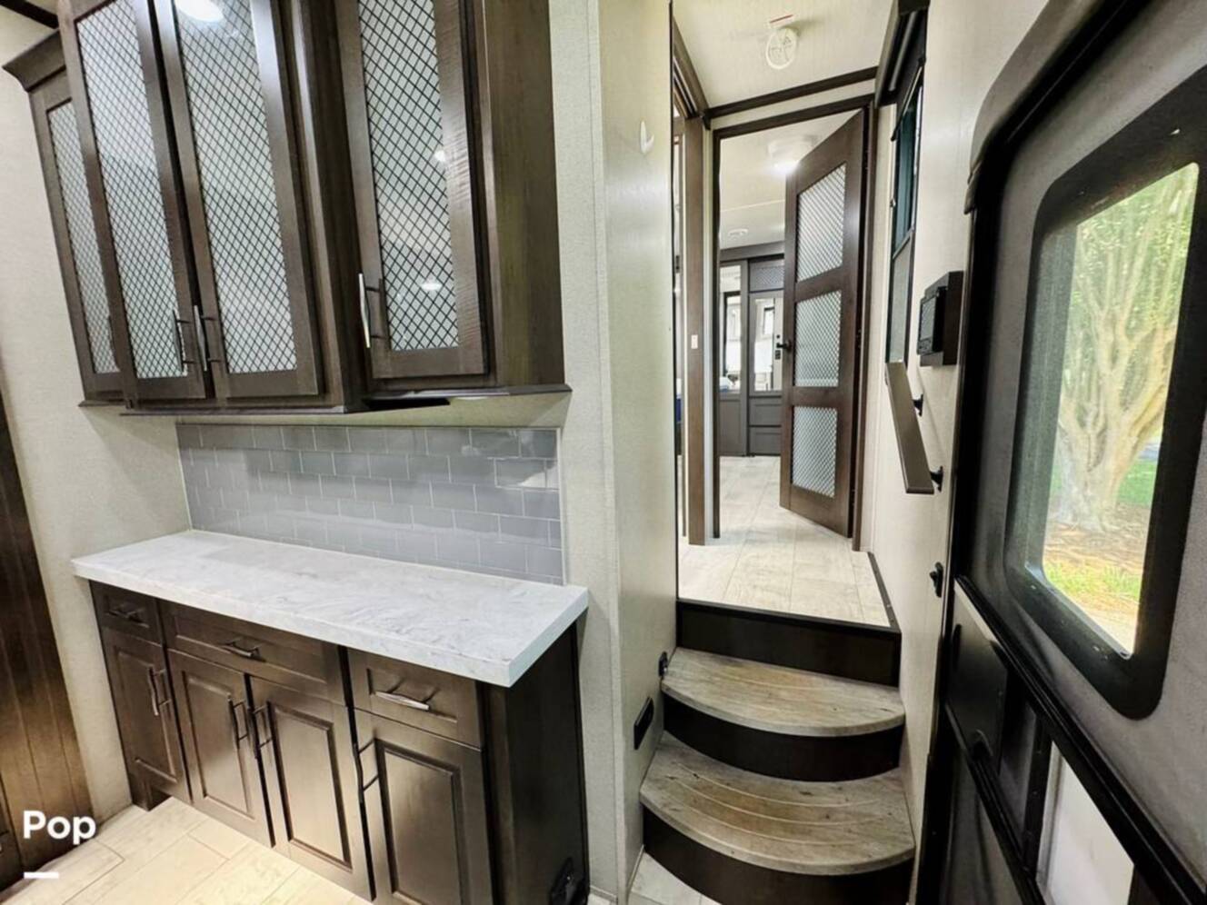 A photo of this 2022 Grand Design Momentum M-Class 351MS