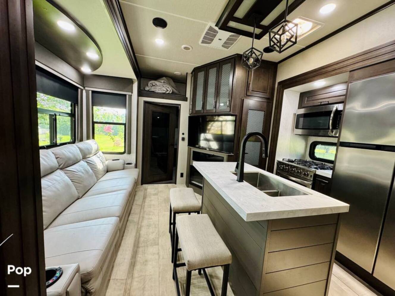 A photo of this 2022 Grand Design Momentum M-Class 351MS