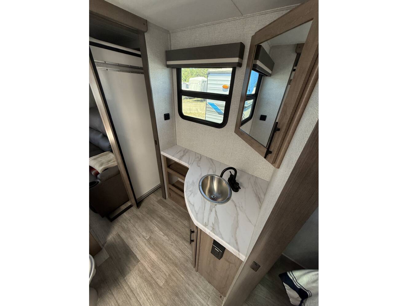 A photo of this 2023 Grand Design IMAGINE XLS 23LDE