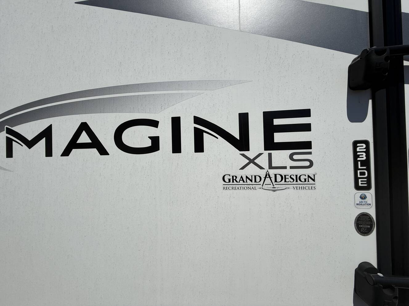 A photo of this 2023 Grand Design IMAGINE XLS 23LDE