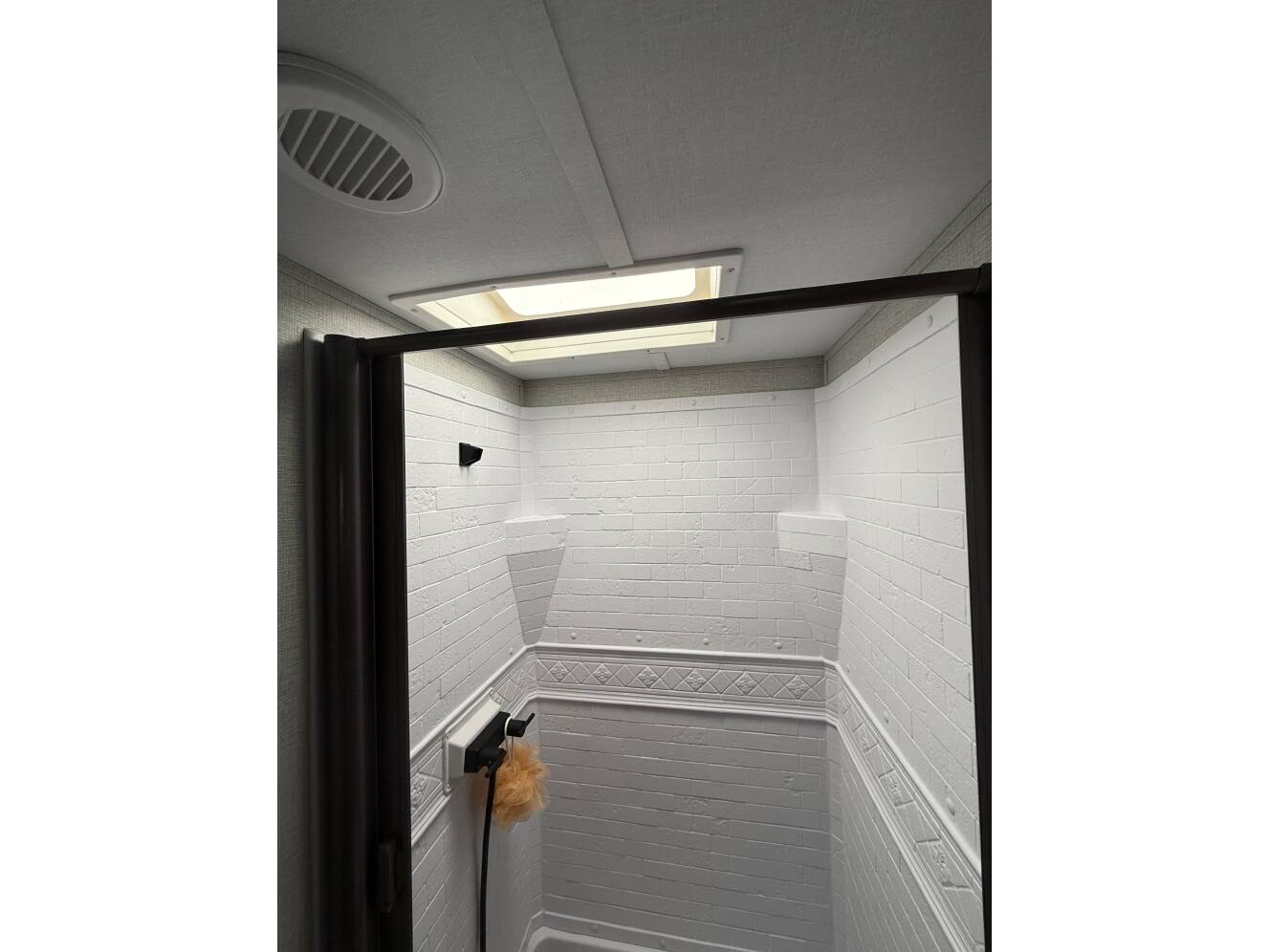 A photo of this 2023 Grand Design IMAGINE XLS 23LDE