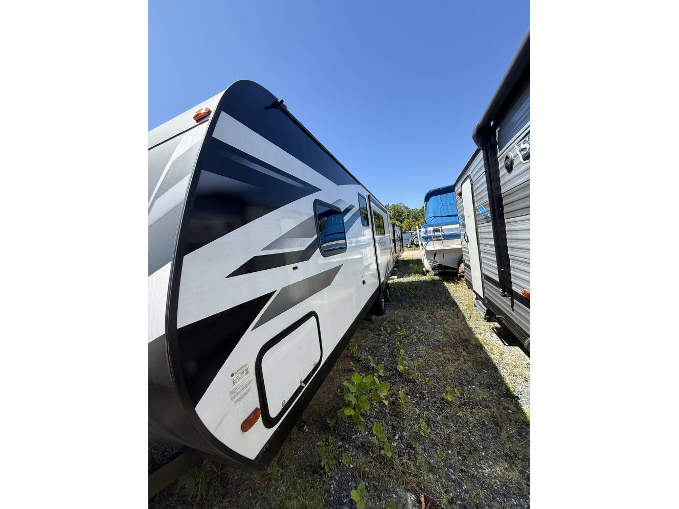 A photo of this 2023 Grand Design IMAGINE XLS 23LDE