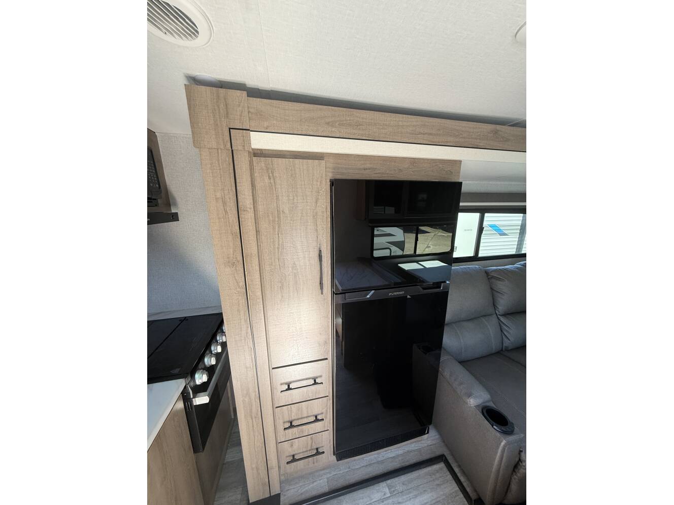 A photo of this 2023 Grand Design IMAGINE XLS 23LDE