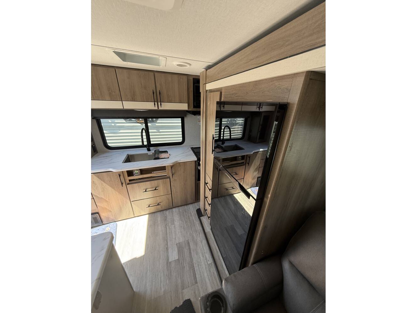 A photo of this 2023 Grand Design IMAGINE XLS 23LDE