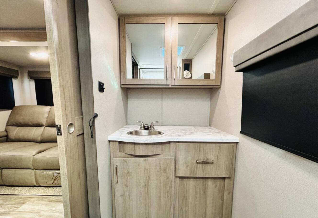 A photo of this 2022 Grand Design IMAGINE XLS 22RBE