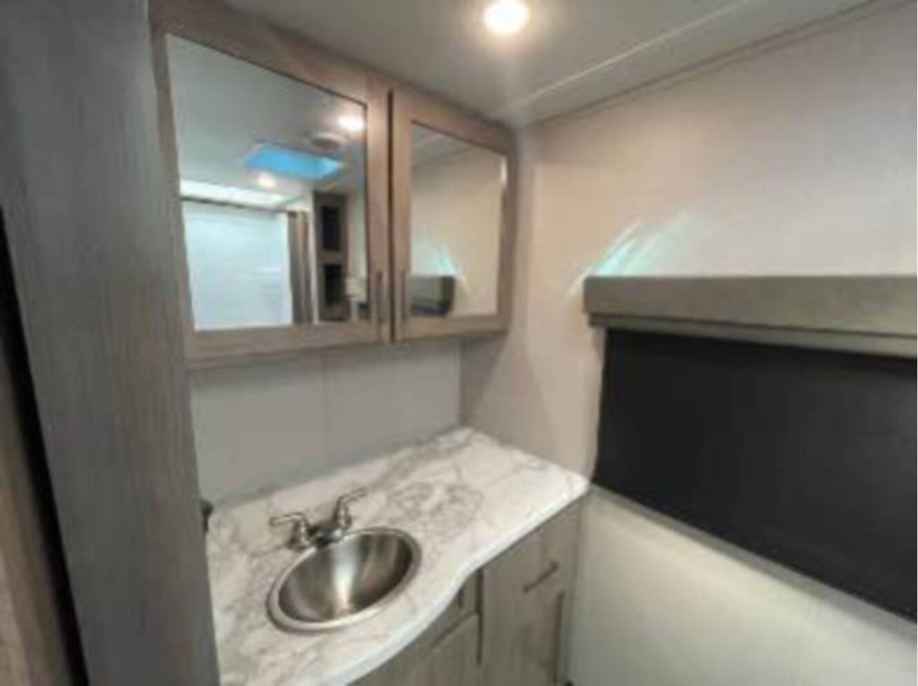 A photo of this 2022 Grand Design IMAGINE XLS 22RBE