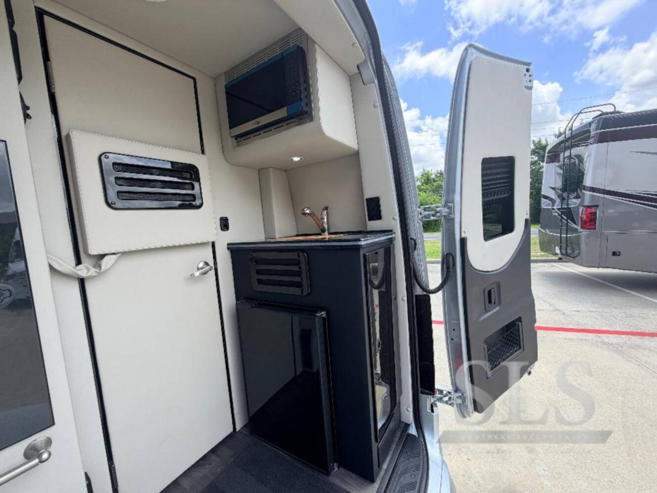 A photo of this 2027 Midwest Automotive Designs Luxe Cruiser D6 AWD 170 EXT