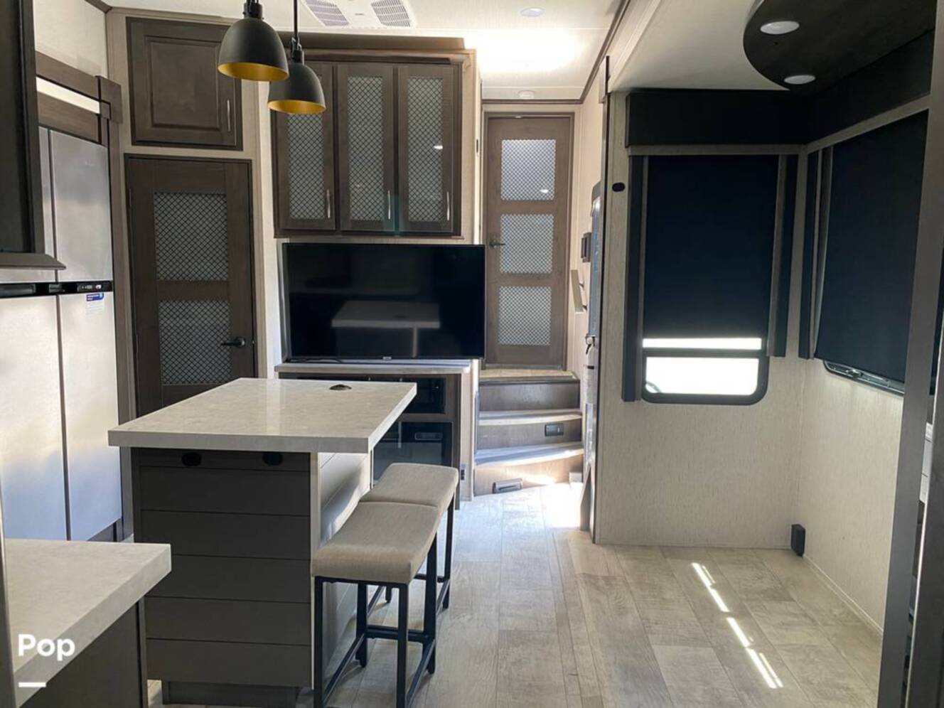 A photo of this 2022 Grand Design Momentum M-Class 398M