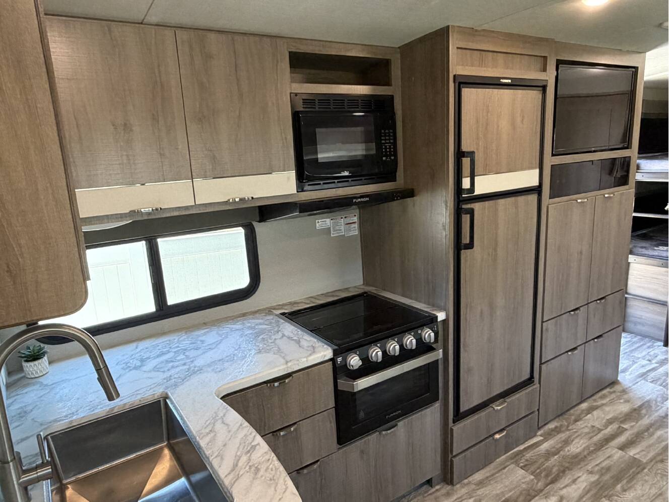 A photo of this 2021 Grand Design IMAGINE 2800BH