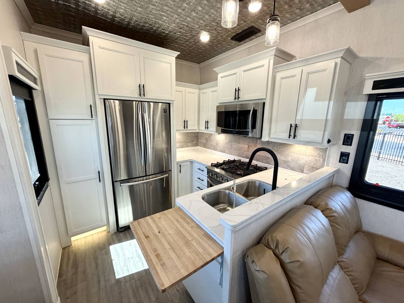 A photo of this 2021 Forest River RIVERSTONE RESERVE 3850RK