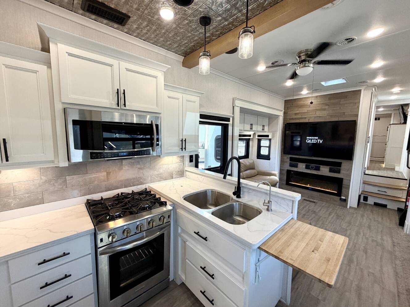 A photo of this 2021 Forest River RIVERSTONE RESERVE 3850RK