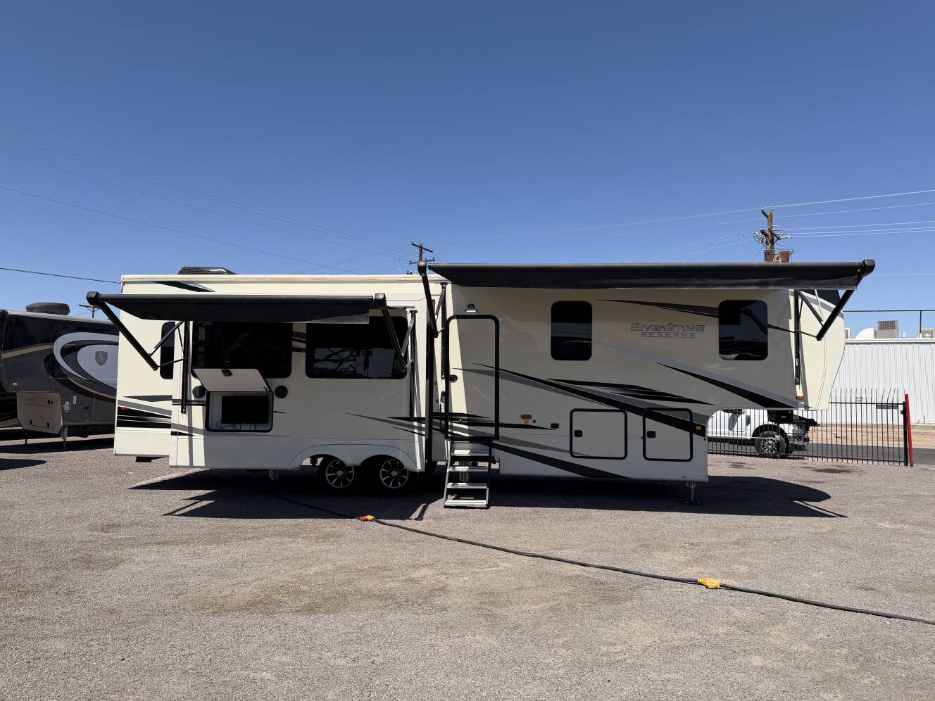 A photo of this 2021 Forest River RIVERSTONE RESERVE 3850RK
