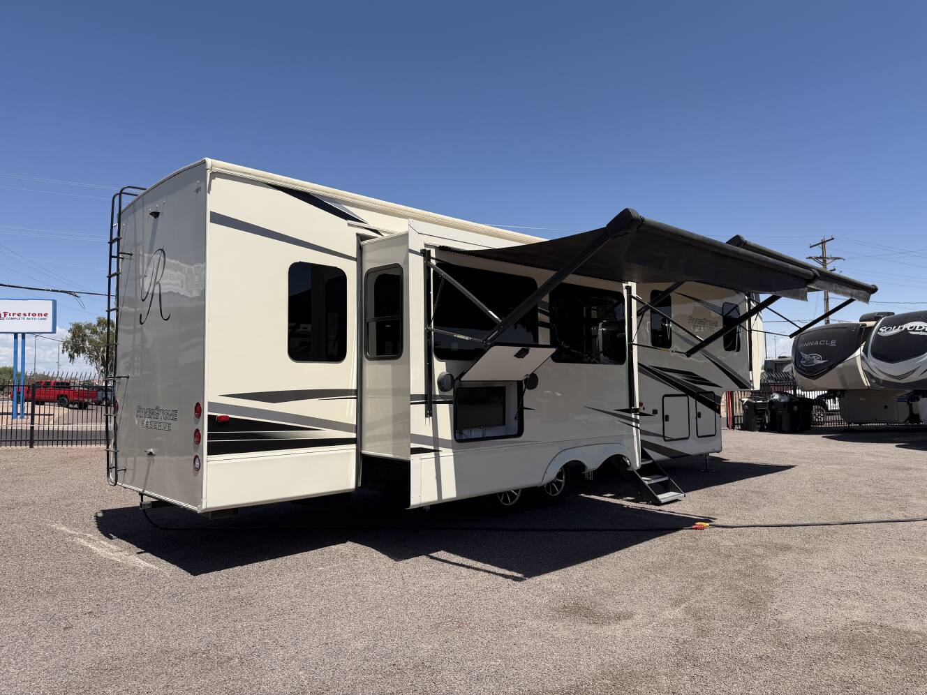 A photo of this 2021 Forest River RIVERSTONE RESERVE 3850RK