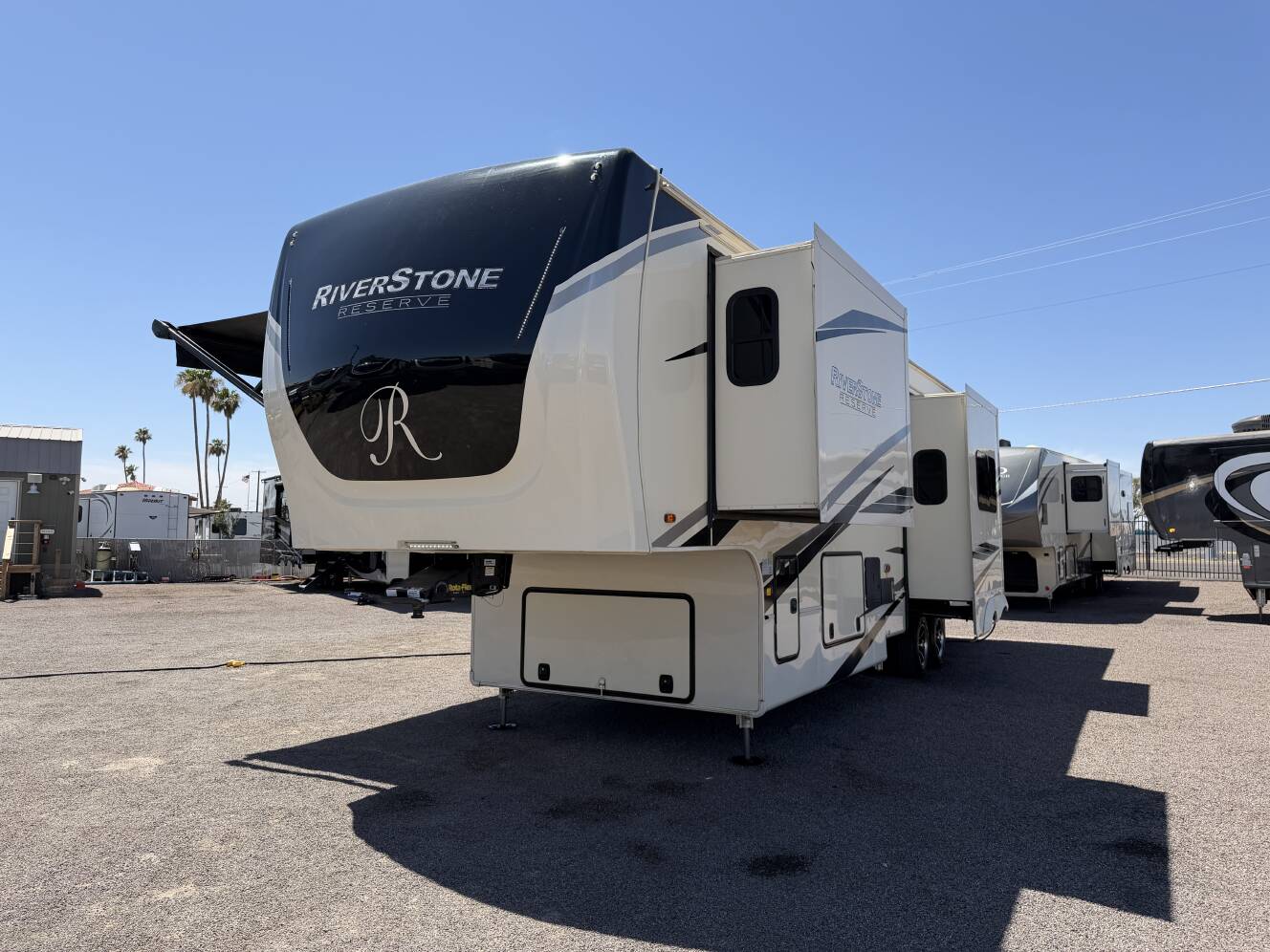 A photo of this 2021 Forest River RIVERSTONE RESERVE 3850RK