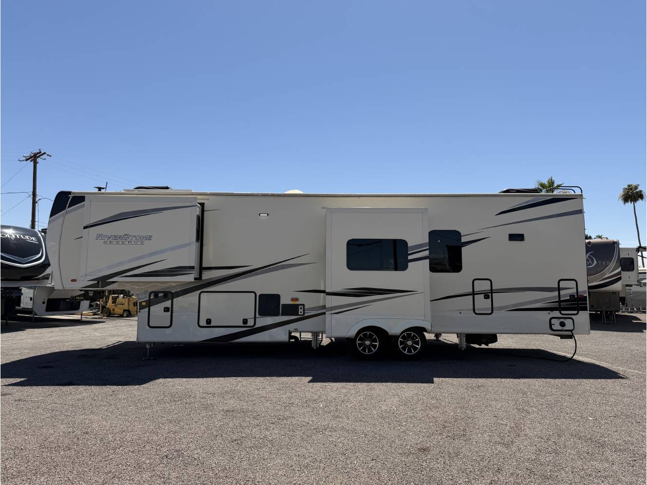 A photo of this 2021 Forest River RIVERSTONE RESERVE 3850RK