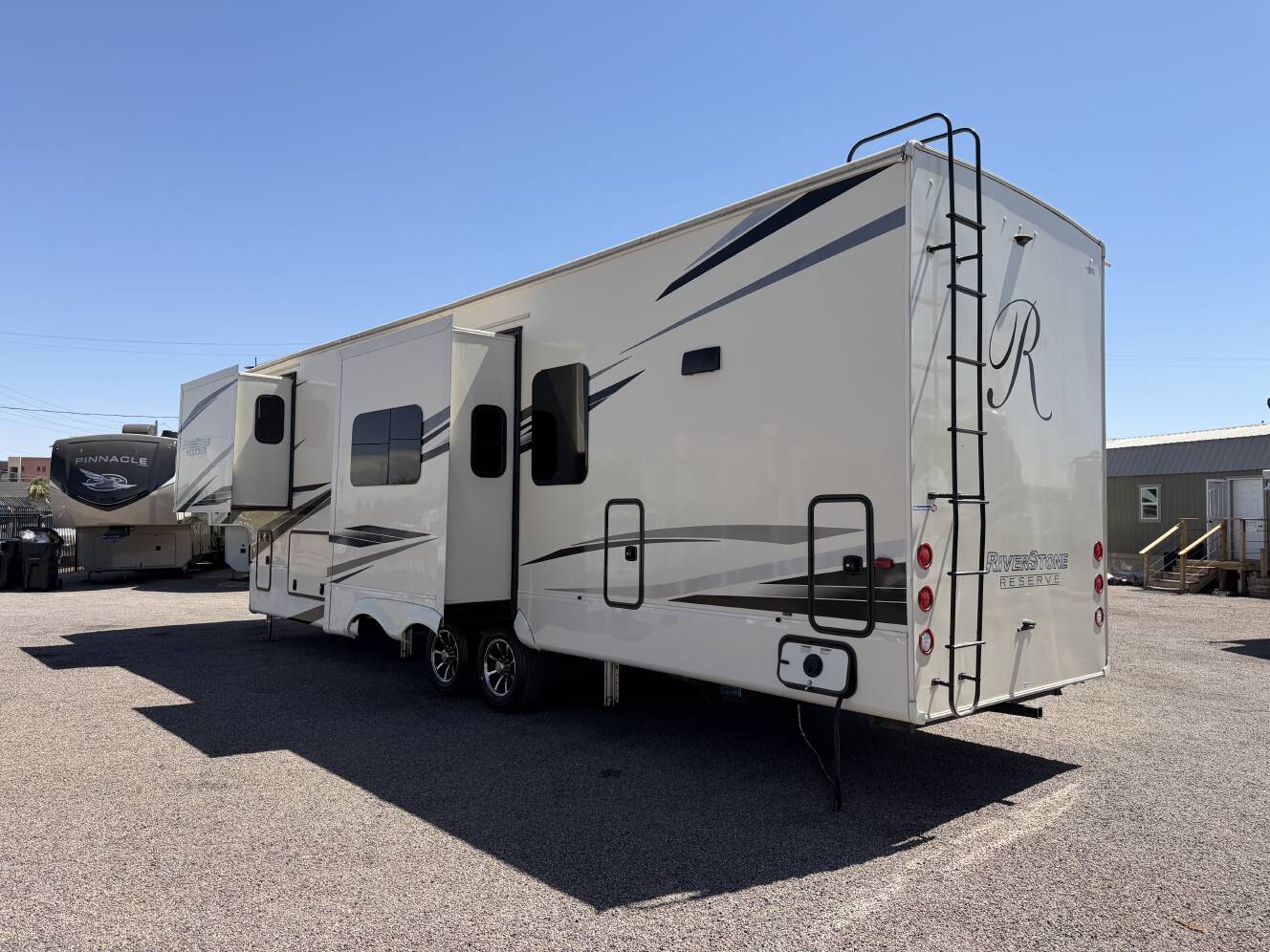 A photo of this 2021 Forest River RIVERSTONE RESERVE 3850RK