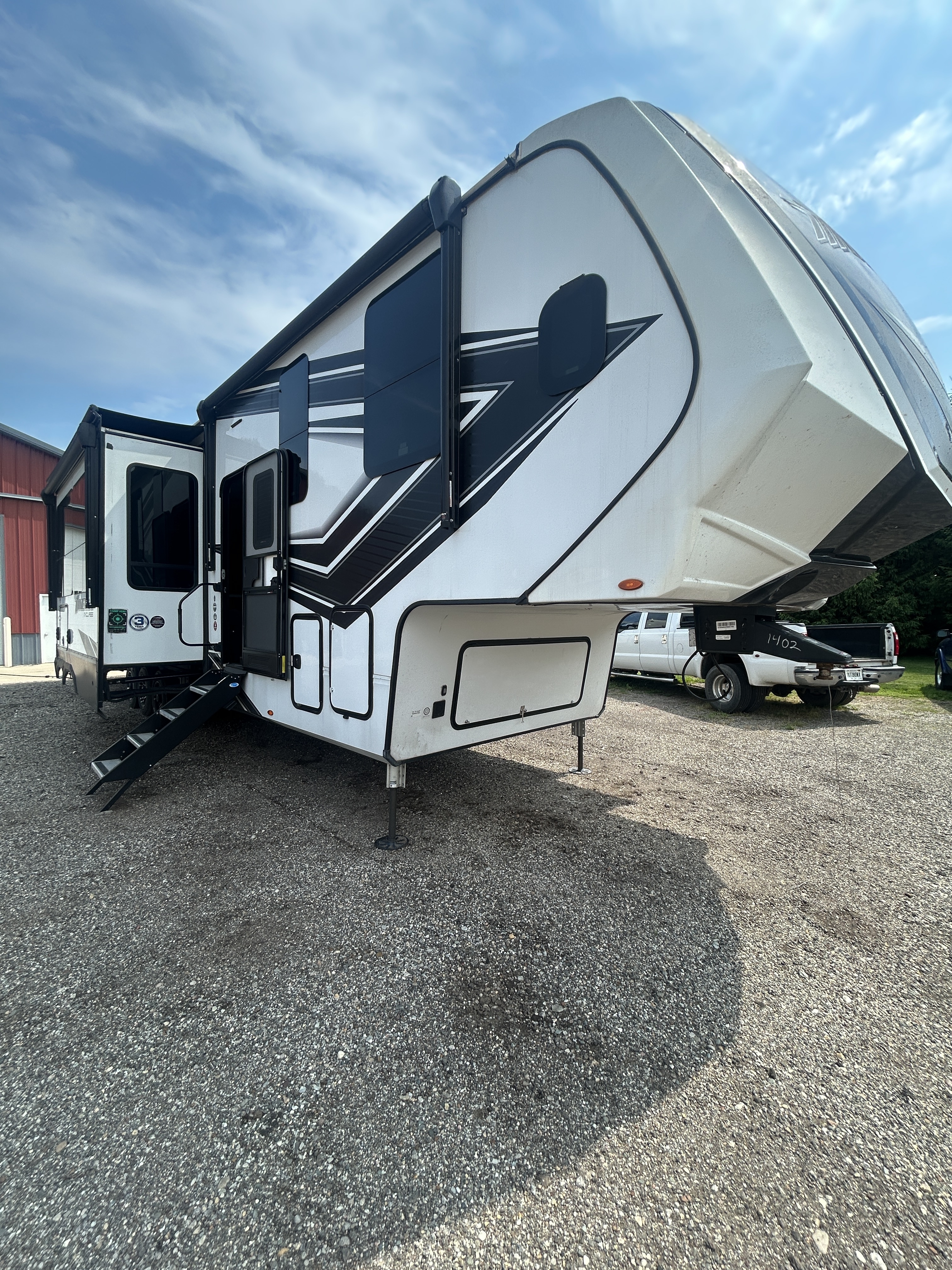 2024 Grand Design MOMENTUM 395MS Fifth Wheel Toy Hauler RV