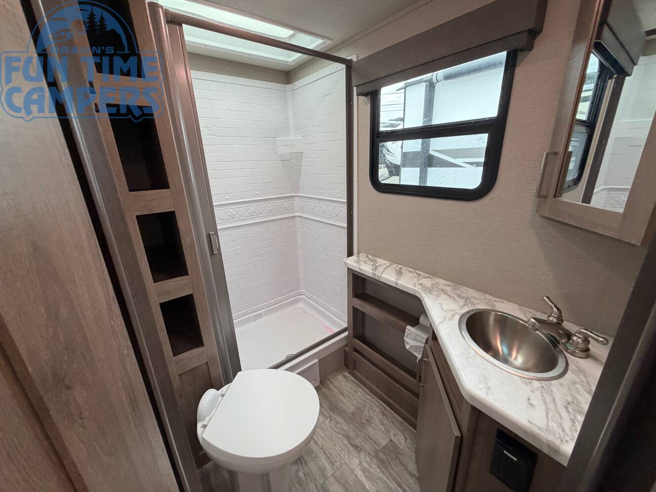 A photo of this 2022 Grand Design IMAGINE XLS 21BHE