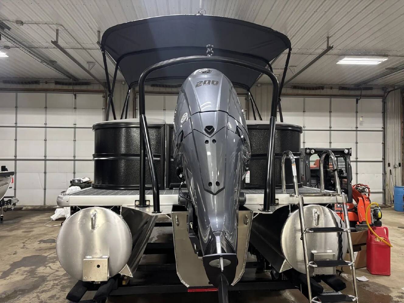 A photo of this 2026 Premier SUNSCAPE 220 RF PTX TRIPLE 200HP BUNK TRAILER