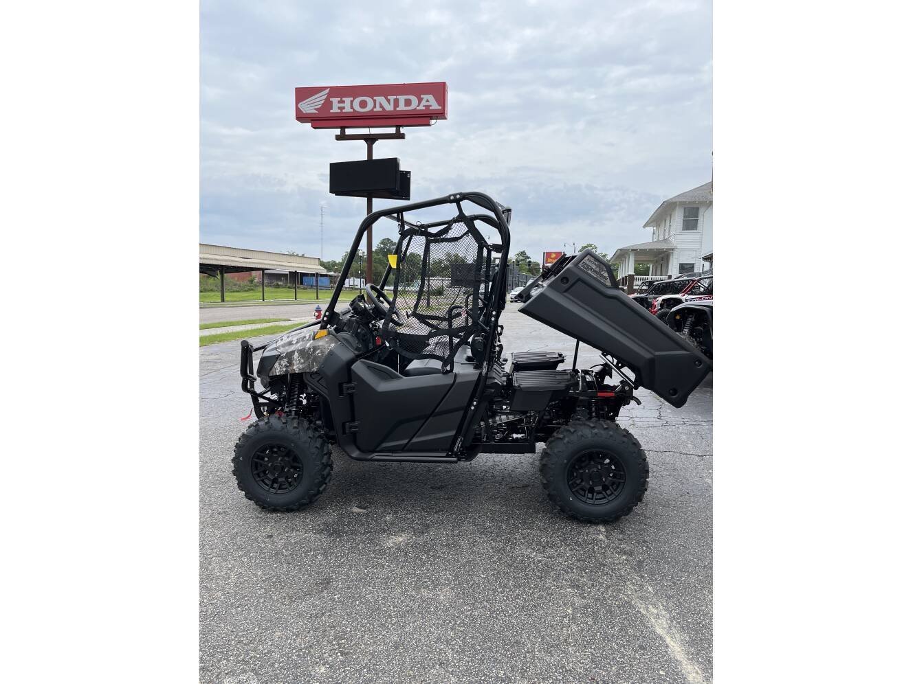 A photo of this 2026 Honda PIONEER 700 FOREST
