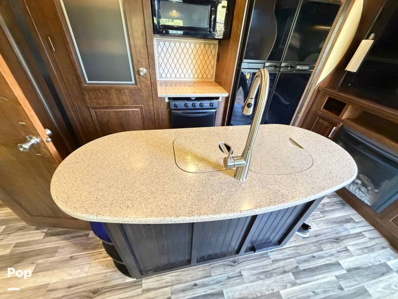A photo of this 2015 Grand Design Momentum 385TH