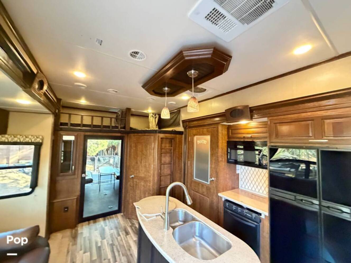 A photo of this 2015 Grand Design Momentum 385TH