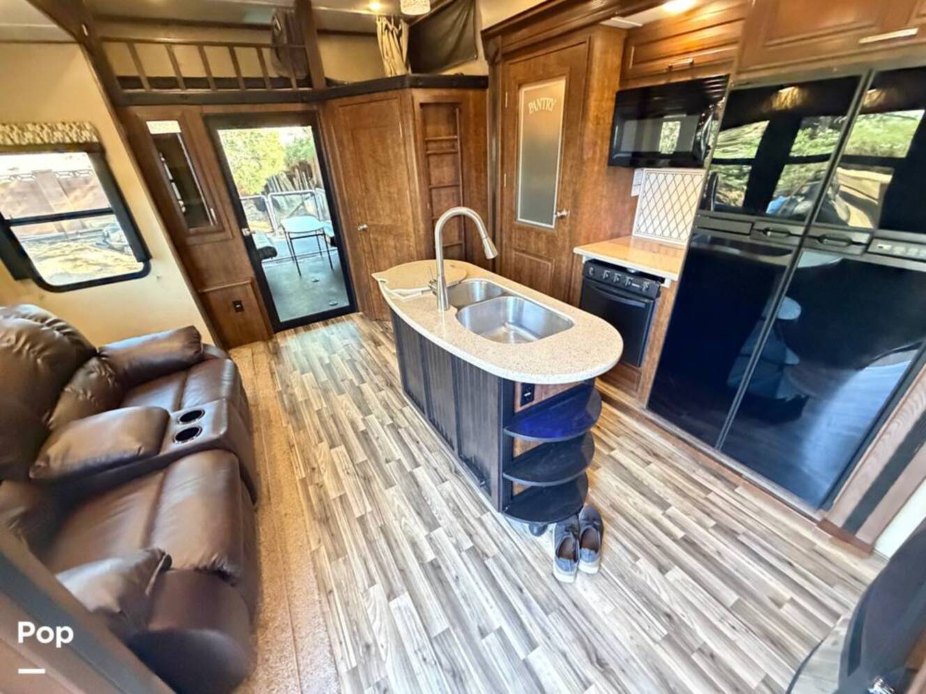 A photo of this 2015 Grand Design Momentum 385TH
